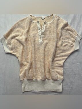 Cream and white vintage style 70s knit top with a relaxed fit